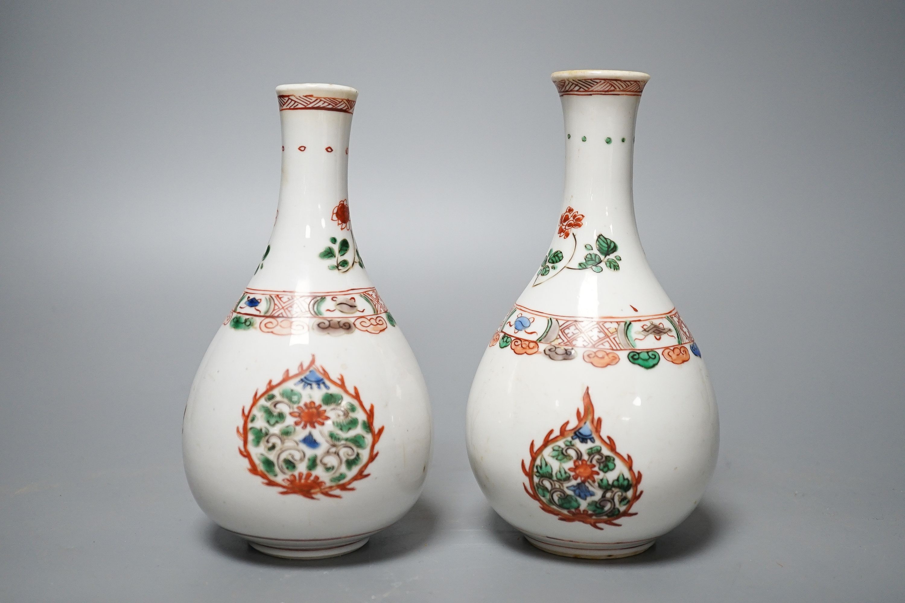 Two Chinese famille verte bottle vases, Kangxi period. 17cm